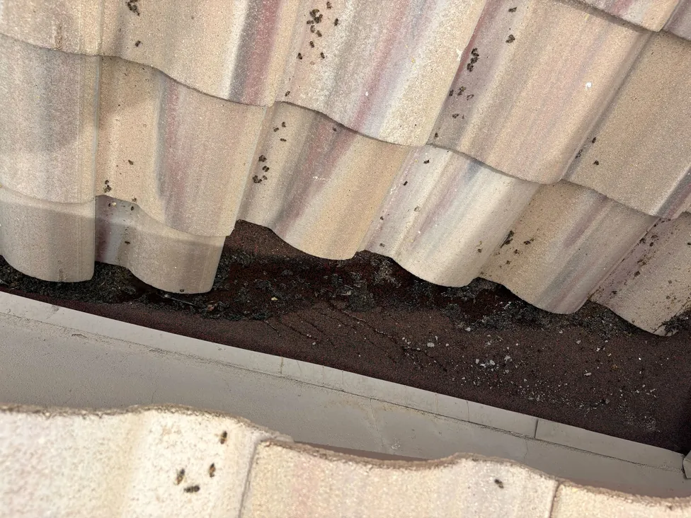 Open channel beneath the first course of barrel roof tile in Phoenix